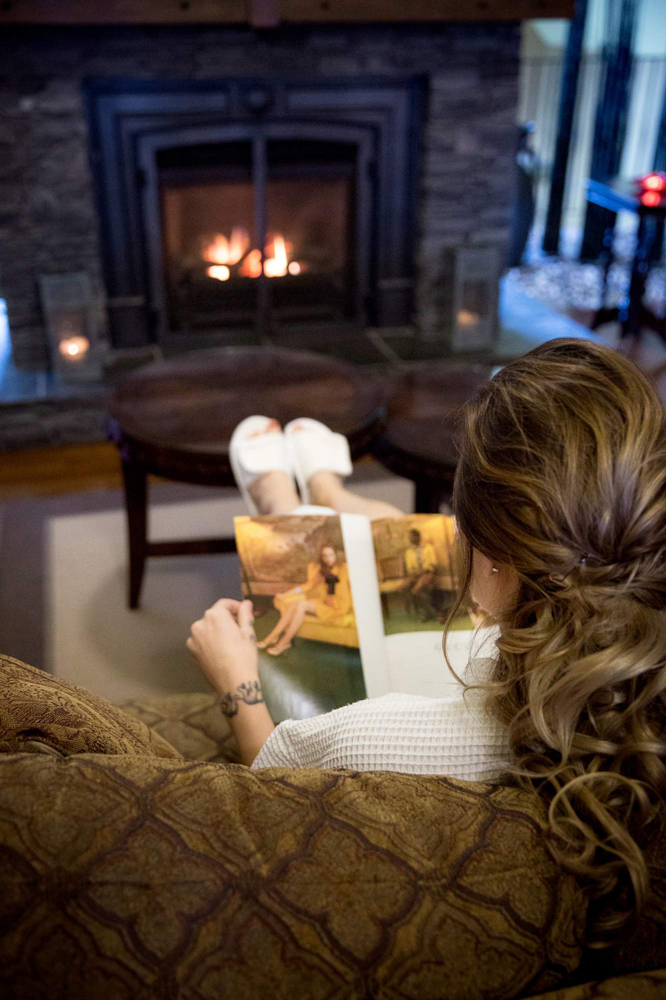Cozy Fireplace in our lounge - Relaxing Spa Experience - Rapunzel Salon & Spa - Canmore