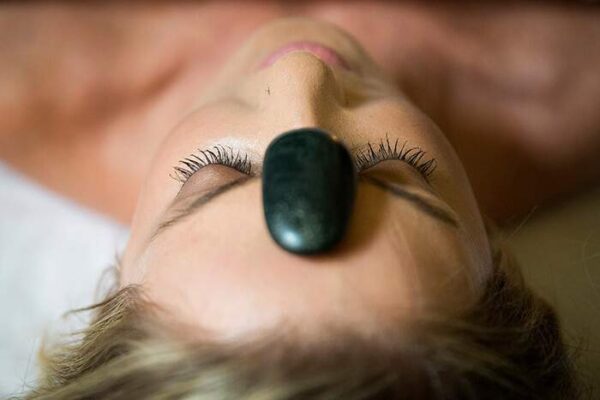 Hot Stone Massage at Rapunzels in Canmore- Come see our amazing massage therapists!