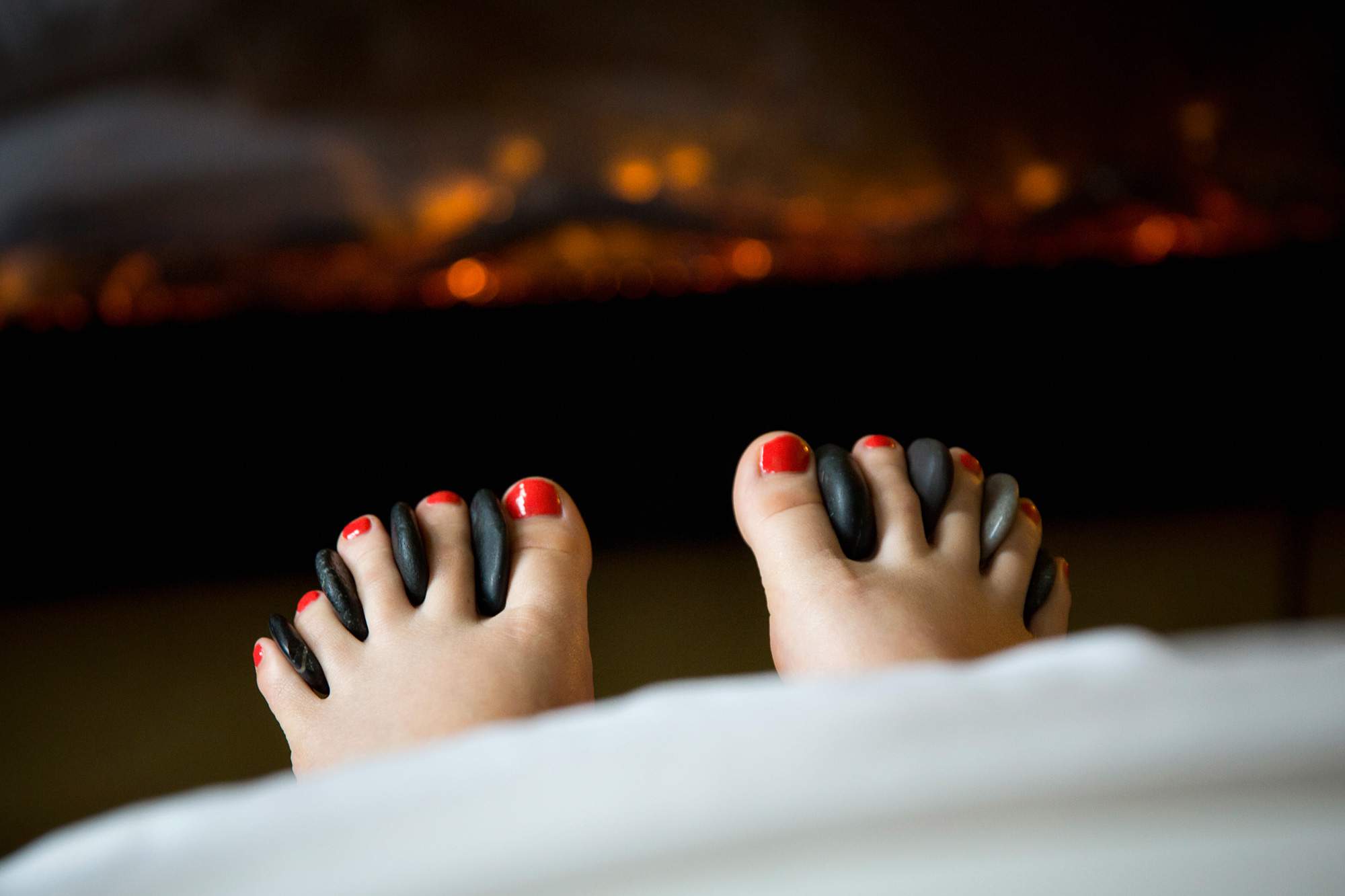 Hot Stone Massage at Rapunzels in Canmore- Come see our amazing massage therapists!